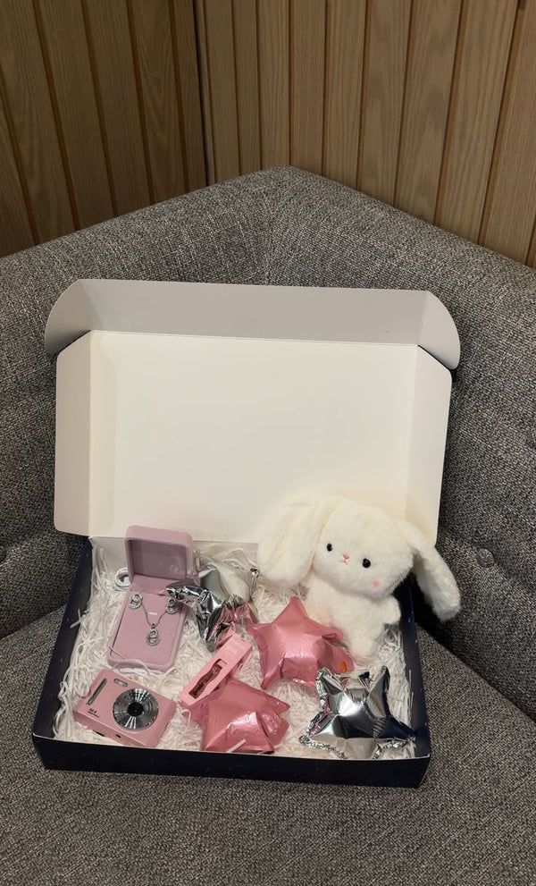 Camera + balloons + lip gloss + necklace + bunny plushie