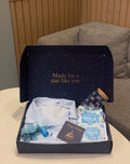 Bow-print pajamas + mug + face mask + lip gloss + hair clip