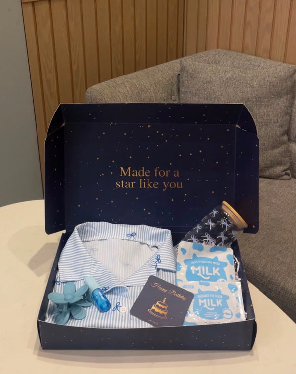 Bow-print pajamas + mug + face mask + lip gloss + hair clip