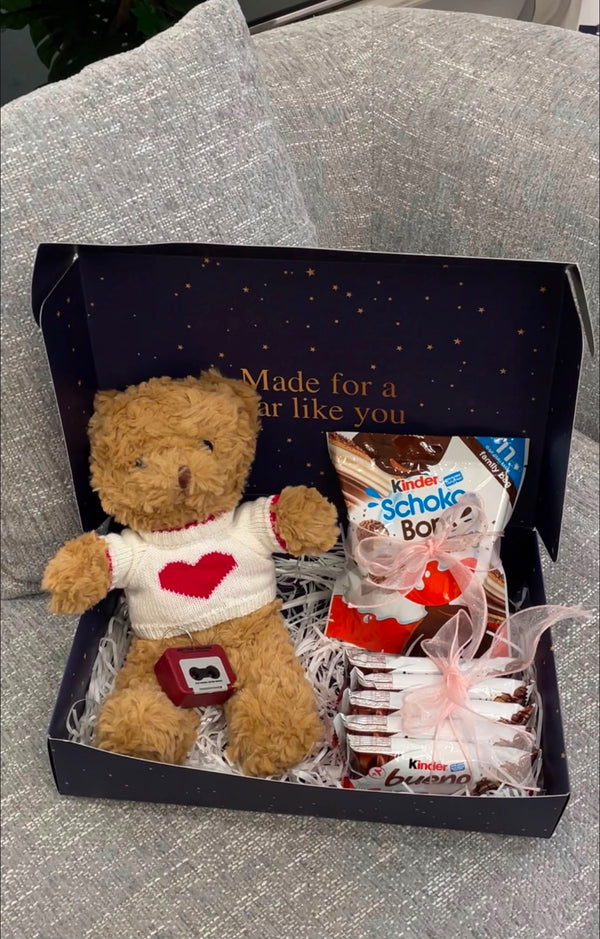 Heart-shaped teddy bear + two types of Kinder + voice recorder